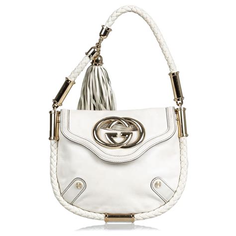 gucci cream small bag|Gucci bag with tassel.